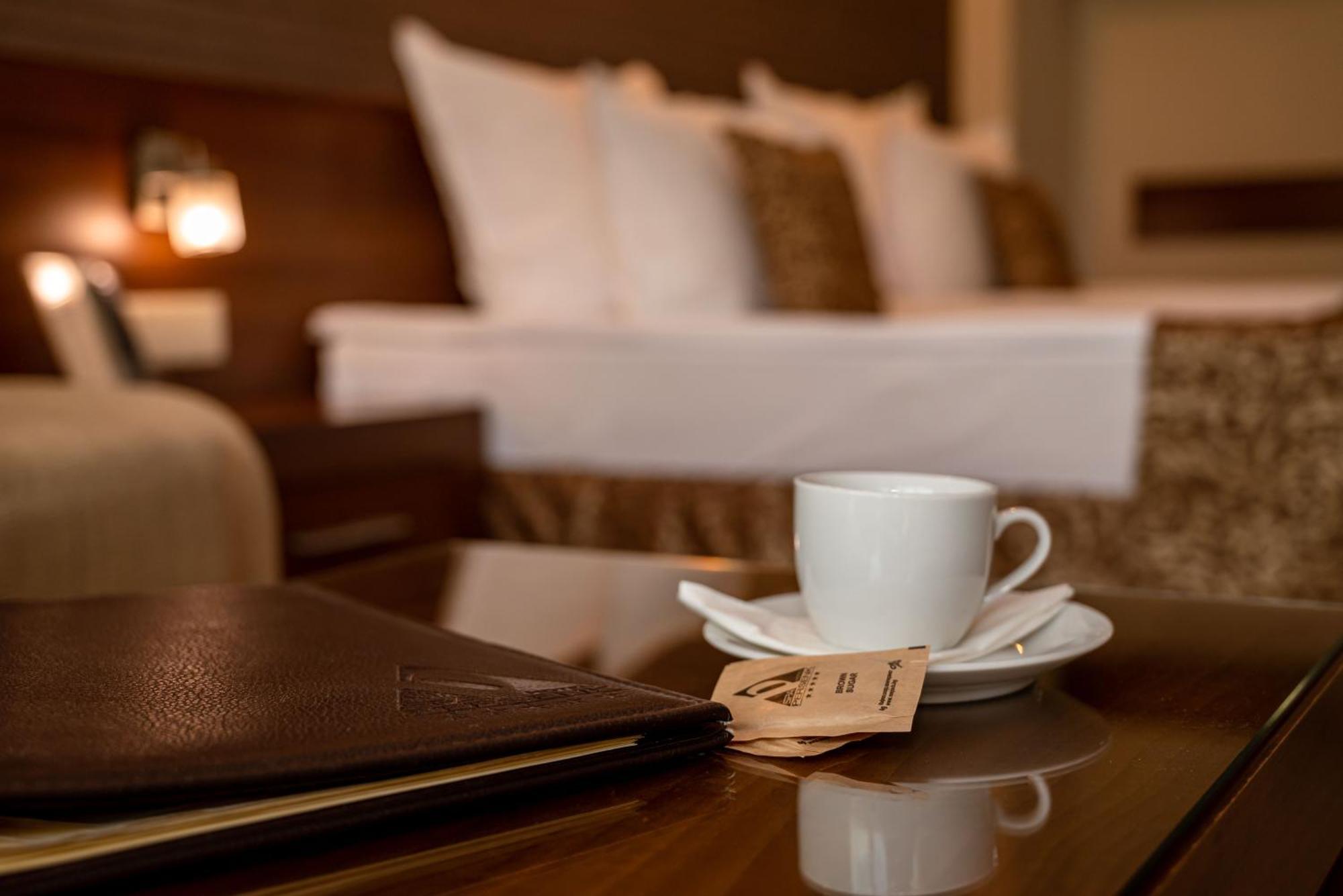 Spa Hotel Persenk 데빈 외부 사진 A coffee cup in a hotel room